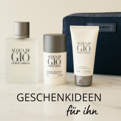 Giorgio Armani Geschenkset „Acqua di Giò“ auf Marmoroberfläche: Eau de Toilette Flakon, Deodorant Stick und Duschgel, elegant arrangiert vor einer dunkelblauen Armani-Kosmetiktasche. Darunter der Schriftzug „Geschenkideen für ihn“.