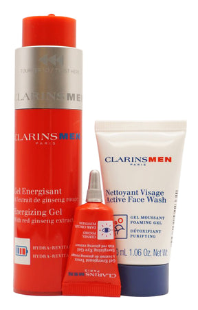 Clarins Men Energizing With Red Ginseng Extract Gesichtsgel Set 50 ml Energizing Gel + 30 ml Active Face Wash Reinigungsschaumgel + 3 ml Energizing Eye Gel + 0.9 ml Double Serum + Täschchen